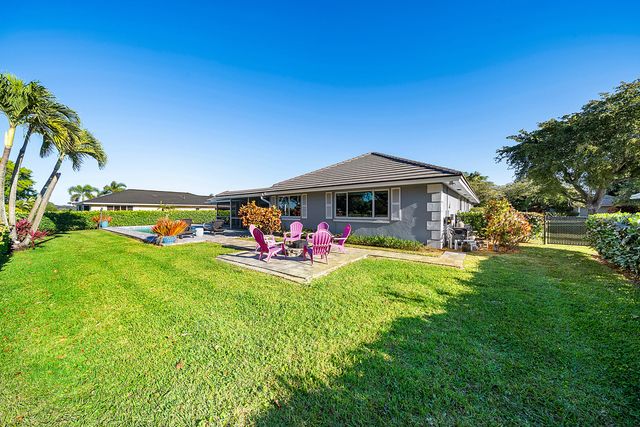 413 S Country Club Drive, Atlantis, FL 33462