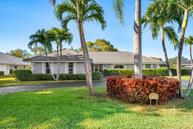 413 S Country Club Drive, Atlantis, FL 33462