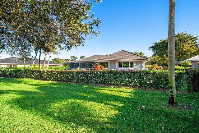 413 S Country Club Drive, Atlantis, FL 33462