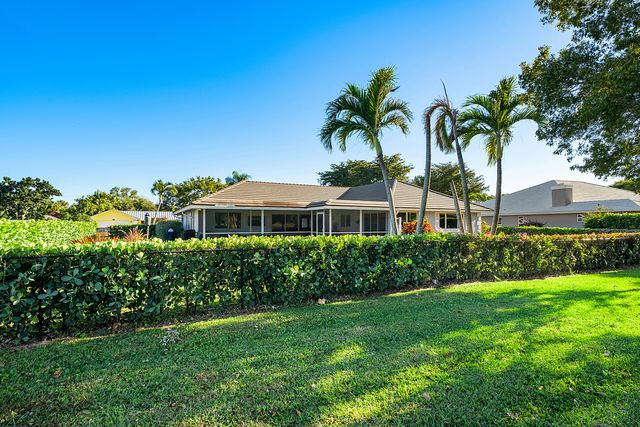 413 S Country Club Drive, Atlantis, FL 33462