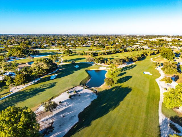 413 S Country Club Drive, Atlantis, FL 33462