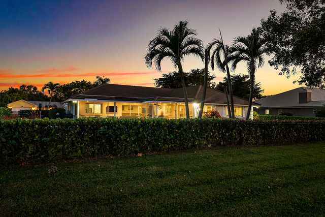 413 S Country Club Drive, Atlantis, FL 33462