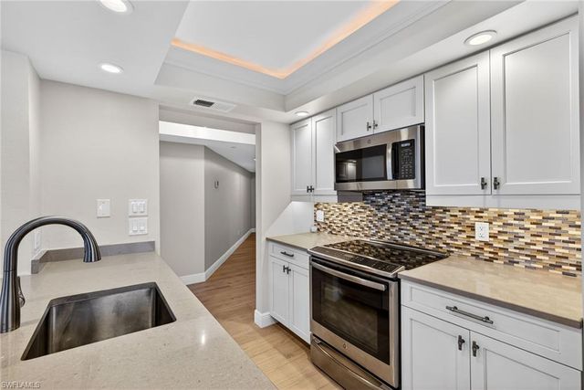 6020 PELICAN BAY BLVD # E402, Naples, FL 34108