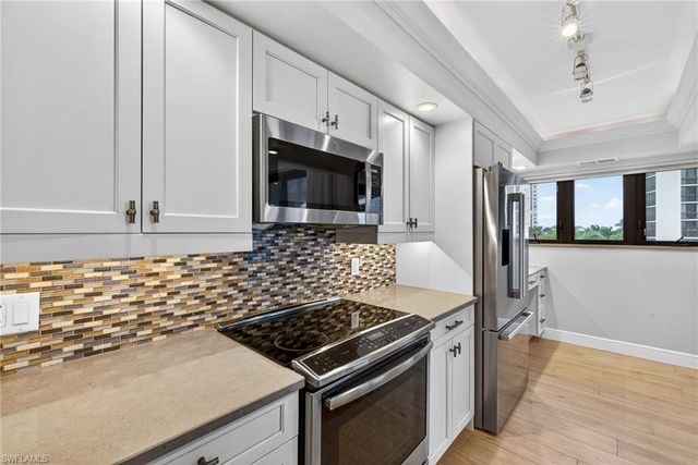 6020 PELICAN BAY BLVD # E402, Naples, FL 34108