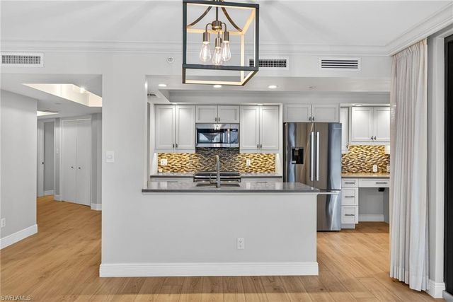 6020 PELICAN BAY BLVD # E402, Naples, FL 34108