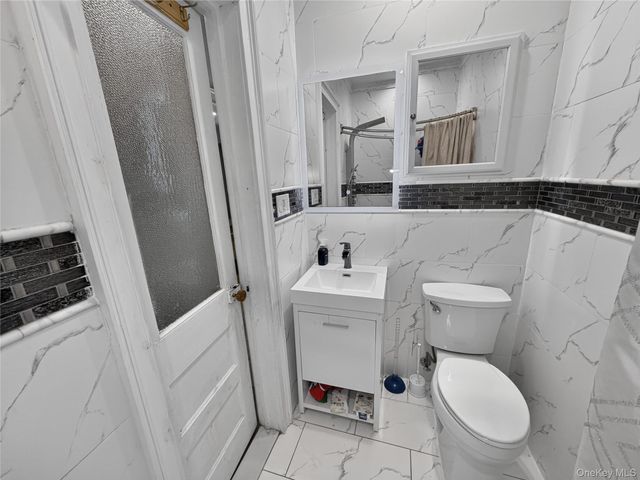 75-37 61ST Street, Ridgewood, NY 11385