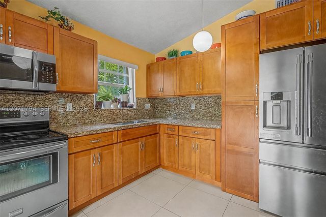 14963 SW 74th Ter, Miami, FL 33193
