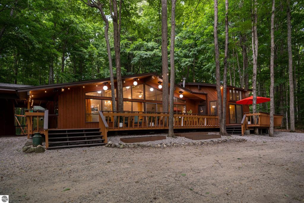 Image 2 of property listing at 5811 East Village Drive, Bellaire, MI 49615