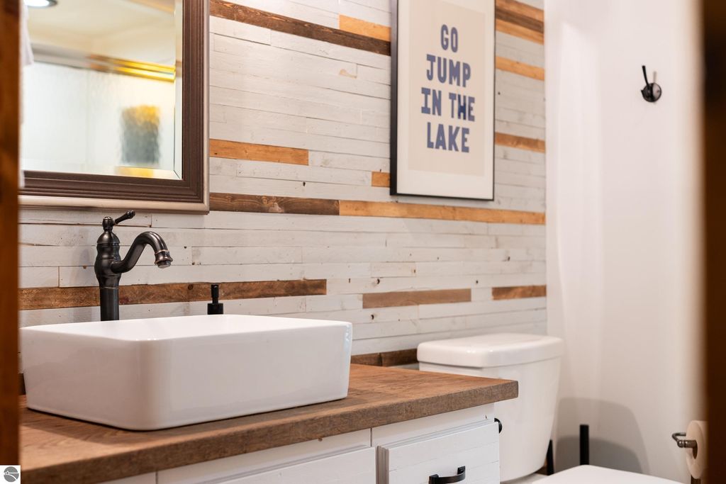 Image 25 of property listing at 5811 East Village Drive, Bellaire, MI 49615