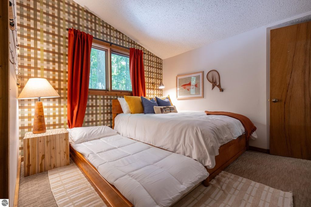 Image 26 of property listing at 5811 East Village Drive, Bellaire, MI 49615