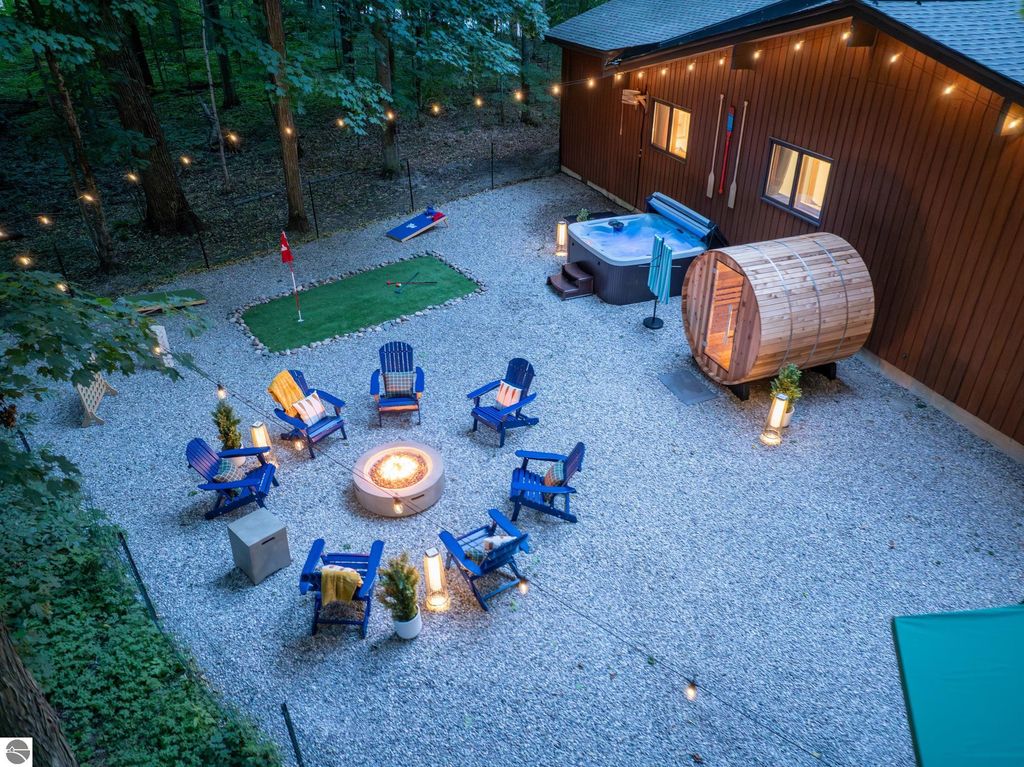 Image 35 of property listing at 5811 East Village Drive, Bellaire, MI 49615