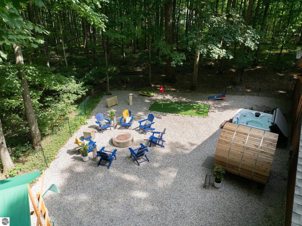 Image 39 of property listing at 5811 East Village Drive, Bellaire, MI 49615