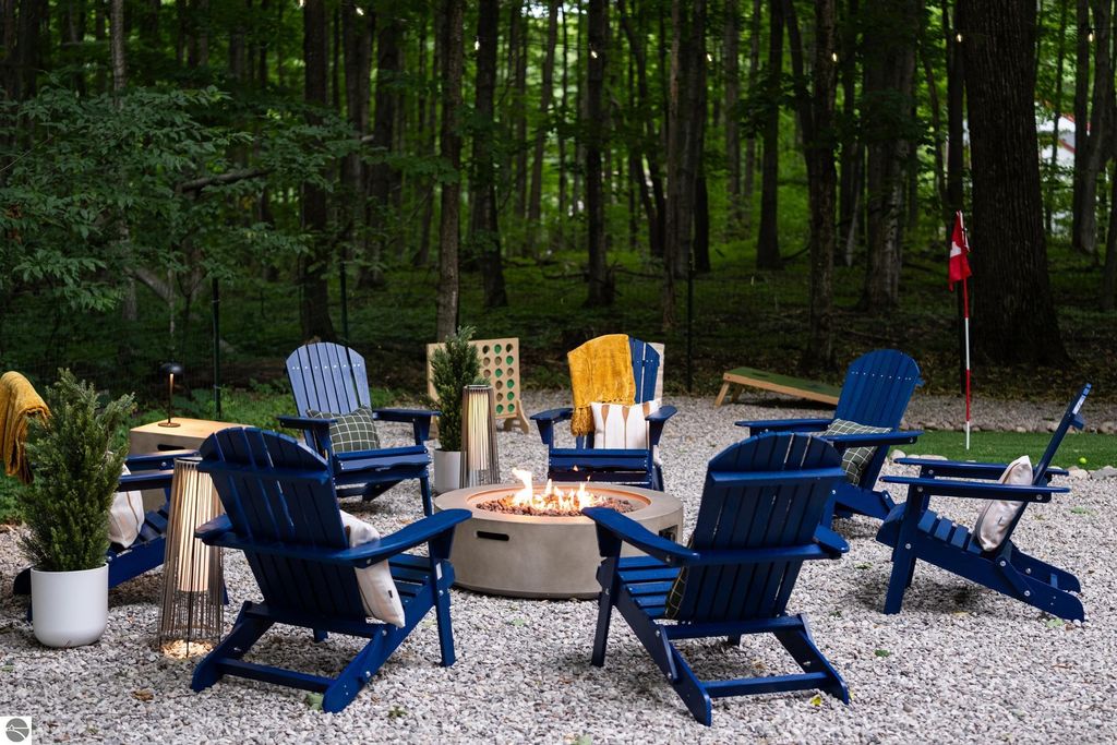 Image 40 of property listing at 5811 East Village Drive, Bellaire, MI 49615