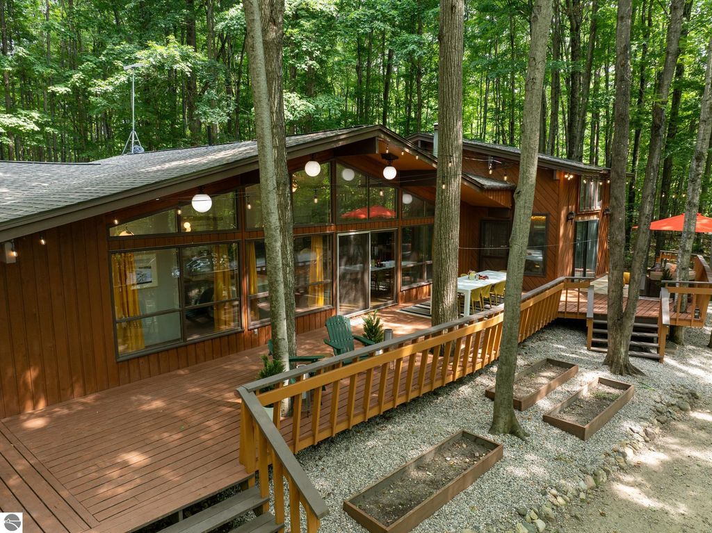 Image 42 of property listing at 5811 East Village Drive, Bellaire, MI 49615