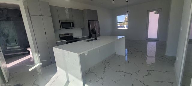 402 Harrison DR, Lehigh Acres, FL 33936