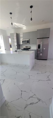 402 Harrison DR, Lehigh Acres, FL 33936