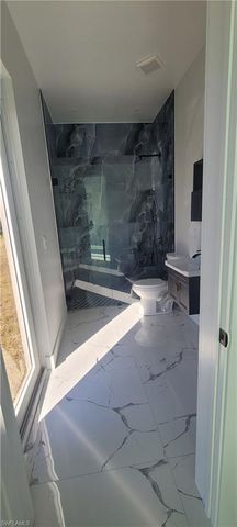 402 Harrison DR, Lehigh Acres, FL 33936