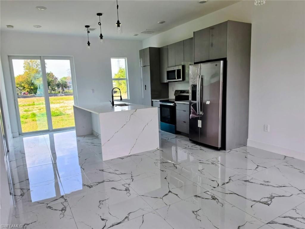 402 Harrison DR, LEHIGH ACRES, FL 33936 — photo 2