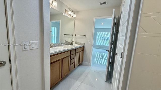 372 Rockland Street, Lehigh Acres, FL 33972