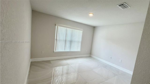 372 Rockland Street, Lehigh Acres, FL 33972