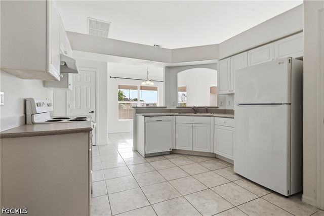 1403 Curtis AVE S, Lehigh Acres, FL 33976