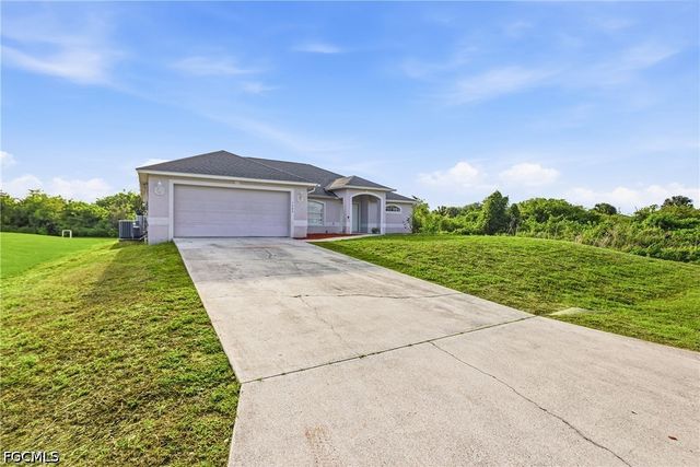 1403 Curtis AVE S, Lehigh Acres, FL 33976