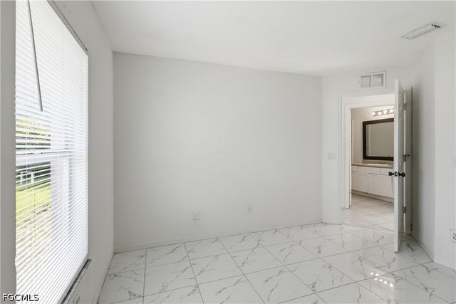 1403 Curtis AVE S, Lehigh Acres, FL 33976