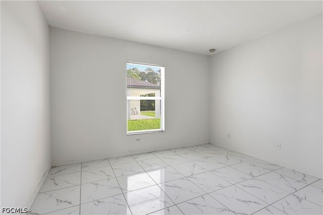 1403 Curtis AVE S, Lehigh Acres, FL 33976