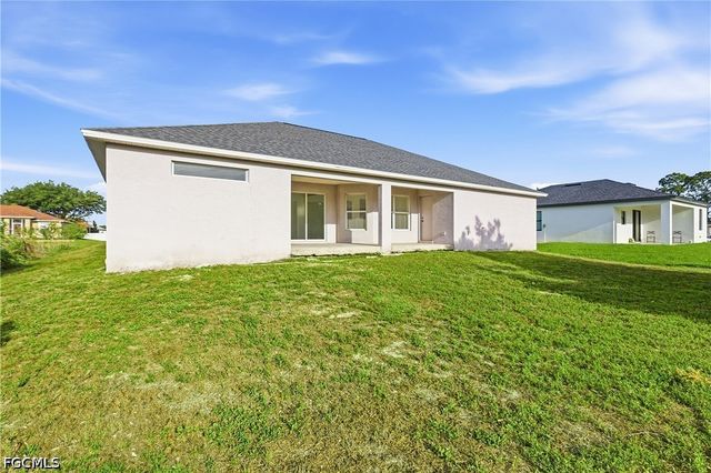 1403 Curtis AVE S, Lehigh Acres, FL 33976