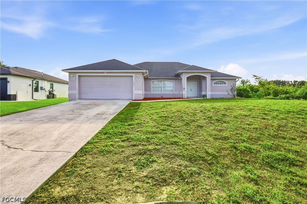 1403 Curtis AVE S, Lehigh Acres, FL 33976