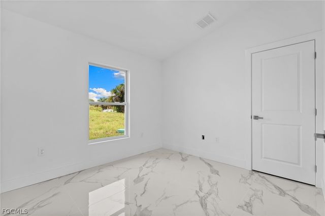 814 Milano AVE S, Lehigh Acres, FL 33974