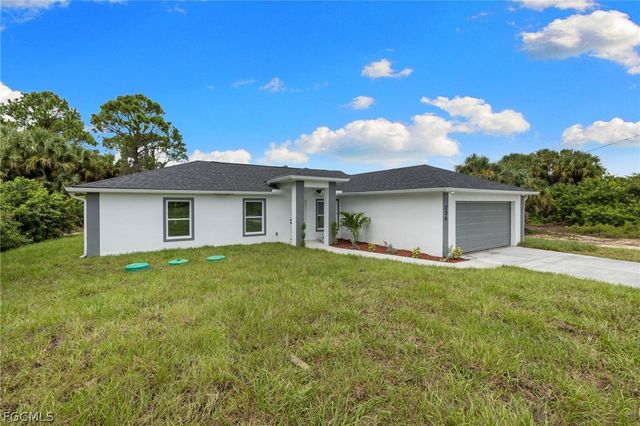 814 Milano AVE S, Lehigh Acres, FL 33974