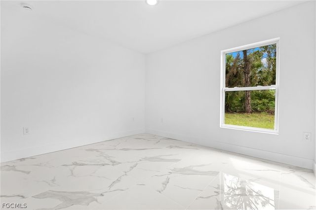 814 Milano AVE S, Lehigh Acres, FL 33974