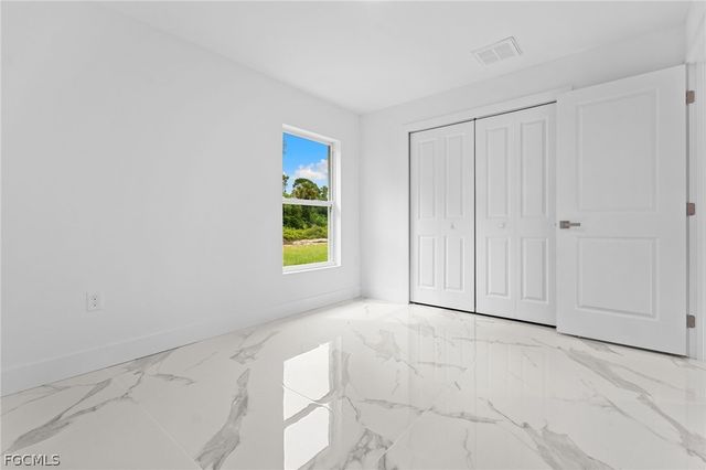 814 Milano AVE S, Lehigh Acres, FL 33974