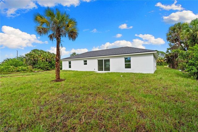 814 Milano AVE S, Lehigh Acres, FL 33974