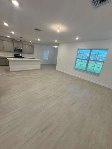 1662 Hoot Owl Holw 1662, Loxahatchee, FL 33470