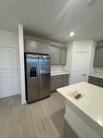 1662 Hoot Owl Holw 1662, Loxahatchee, FL 33470