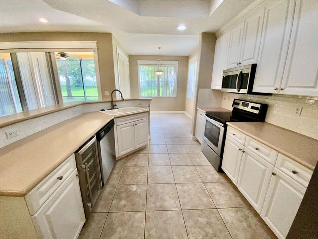 7911 NW 128th Lane 11-c, Parkland, FL 33076