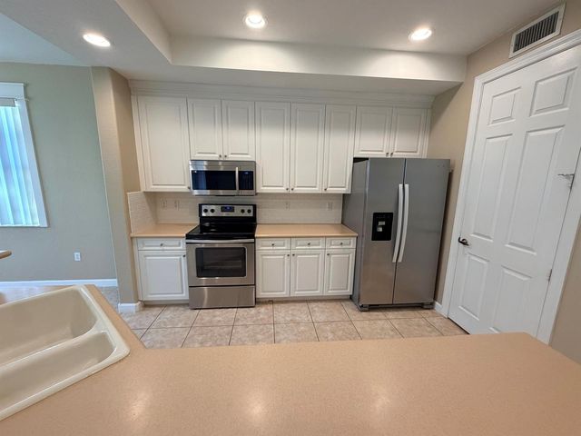 7911 NW 128th Lane 11-c, Parkland, FL 33076