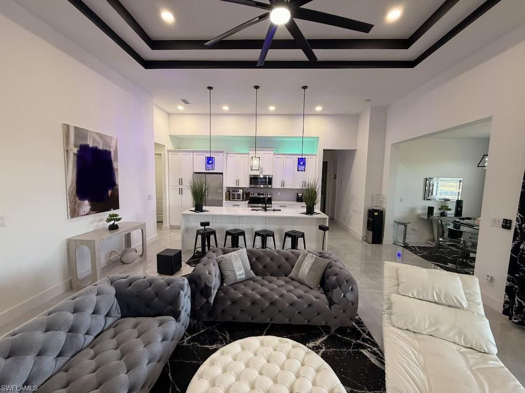 Image 3 of property listing at 907 NE 13th PL, Cape Coral, FL 33909