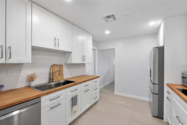 885 Camellia Ct, Plantation, FL 33317