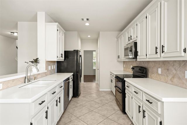 9611 Oxford Grove Drive, Houston, TX 77095