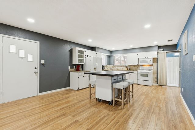 102 Woodland Drive, Highland Village, TX 75077