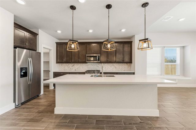 220 Magnolia Laurel Drive, Alvin, TX 77511