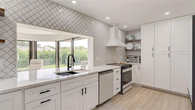 429 Pine Villa Drive, Atlantis, FL 33462