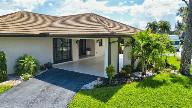 429 Pine Villa Drive, Atlantis, FL 33462