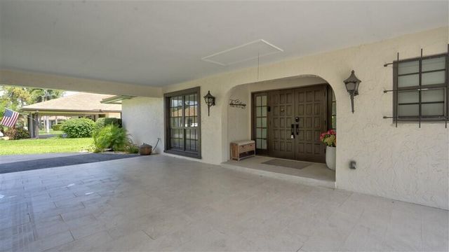 429 Pine Villa Drive, Atlantis, FL 33462