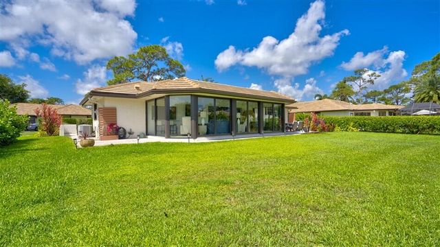429 Pine Villa Drive, Atlantis, FL 33462