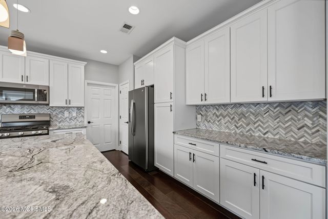 27 Goshawk Court, Morganville, NJ 07751