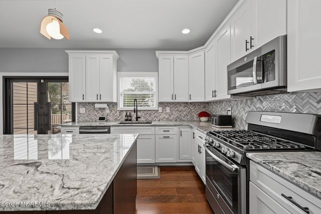 27 Goshawk Court, Morganville, NJ 07751